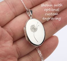 A customizable sterling silver photo locket necklace: 1.  a highly polished solid oval sterling silver oval locket (20 x 27 mm, 5.0 grams). Its front and back can be engraved with text or simple graphics (examples shown in charts).  2. It has two photo slots inside. Photo insertion service is available (selected from the pulldown, notice the price difference). If you select this service, please send your locket photos by attaching them to a conversation to me.  3. a sterling silver cable chain w White Engraved Locket Necklace For Wedding, Engraved White Locket Necklace For Wedding, White Locket Jewelry For Personalized Gifts, Personalized White Locket Jewelry, Silver Locket Necklace For Memorial On Mother's Day, Silver Locket Necklace For Mother's Day Memorial, White Round Locket Necklace For Anniversary, White Oval Locket Necklace For Anniversary, Classic White Locket Necklace As Gift