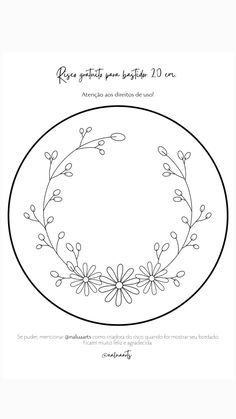 a circular frame with flowers and leaves drawn in black ink on a white paper background