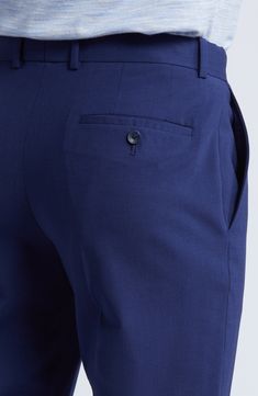 Smart and versatile, these dress pants tailored from polished wool feature a touch of stretch to keep you moving comfortably at any formal occasion. 36 1/2" inseam; 15" leg opening; 9 1/2" front rise; 15" back rise (size 30) Zip fly with hook-and-bar closure Front slant pockets 96% wool, 4% elastane Dry clean Imported Formal Solid Wool Dress Pants, Tailored Solid Wool Dress Pants, Formal Wool Dress Pants In Solid Color, Tailored Solid Dress Pants For Office Wear, Tailored Wool Dress Pants, Solid Wool Dress Pants For Work, Fitted Solid Dress Pants For Office Wear, Flat Front Pants With Extra Button For Workwear, Semi-formal Tailored Solid Dress Pants