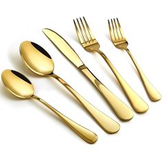 gold colored utensils and spoons on a white background