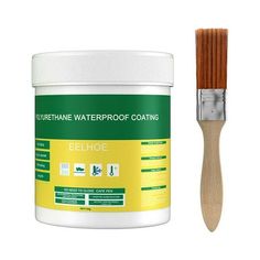 a paint brush next to a container of waterproof coating