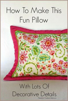 a pillow that has been made with lots of decorative details in pink and green colors