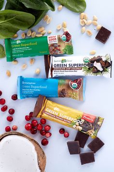 the ingredients to make green superfood bars are laid out on a white surface