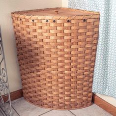 This large-sized Amish woven wood corner hamper comes complete with a removable lid. This all-natural large wicker laundry hamper has an oversized holding capacity yet its special space-saving corner hamper shape with lid lets you easily display and use this hamper in any room in your home. This basket’s big vertical shape combines with this large wicker laundry hamper’s strong internal wood frame to provide you with an enjoyable and functional laundry room gem that goes perfectly with any rusti Primitive Interior Design, Corner Laundry, Buttermilk Cookies, Primitive Interiors, Hamper Baskets, Woven Hamper, Wicker Laundry Hamper, Woven Laundry Basket, Large Laundry Basket