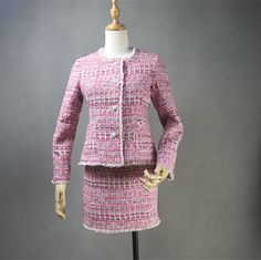 Dress in vibrant elegance with our Custom Made Skirt Suit in Multi-color Pink Tweed, featuring a Pink Blazer paired with your choice of Skirt or Shorts. This lively ensemble is perfect for wedding receptions, formal events, and makes for a thoughtful personalized gift. Plus size options are available for a perfect fit. 🌺 Tailored to Perfection: Each piece is meticulously crafted to your measurements, ensuring a custom fit that celebrates your unique style. Revel in the luxury of a skirt suit designed exclusively for you. 🎨 Multi-color Pink Tweed Radiance: The lively multi-color pink tweed adds a vibrant touch to this ensemble, creating a look that is both chic and full of personality. Embrace the beauty of a suit that stands out with grace. 💖 Versatile Skirt/Shorts Suit: Choose between Skirt For Wedding Guest, Pink Tweed Blazer, Pink Tweed Skirt, Wedding Guest Skirt, Tweed Skirt Suit, Womens Suits, Pink Tweed, Skirt Shorts, Blue Tweed