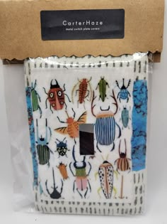 a box with an insect design on it