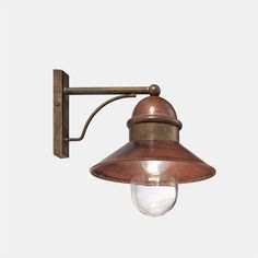 an old fashioned wall light on a white background