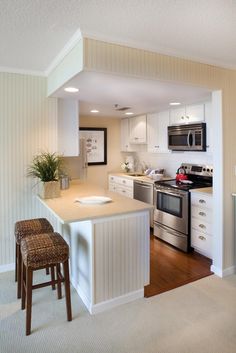 the kitchen is clean and ready to be used as a living room or dining area