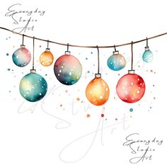 watercolor christmas ornaments hanging from a string