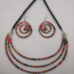 Set Of Earrings, Necklace And Bracelet Woven In A Multicolored Blanket. These Earrings Were Made By Peruvian Artisans From Cusco, Using Ancient Handmade Cloaks With Natural Pigments. These Earrings Are Handmade By Peruvian Artisans From The Andean Community. Fair Trade Multicolor Round Bead Jewelry, Blue Fair Trade Jewelry, Multicolor Handmade Multi-strand Jewelry, Handmade Multicolor Multi-strand Jewelry, Fair Trade Multi-strand Jewelry As Gift, Adjustable Multicolor Dangle Jewelry, Multicolor Fair Trade Jewelry For Festivals, Multicolor Fair Trade Festival Jewelry, Handwoven Multi-strand Jewelry Gift