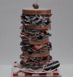 a stack of cloths sitting on top of a table