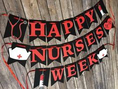 a happy nurses week banner hanging on a wooden wall with scissors and other medical supplies