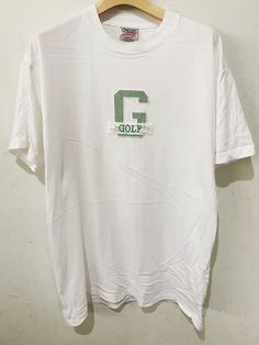 "Brand: Golf Size: M Made In USA Measurements are taken with the garment laying flat. Chest width: 19.5\" Body Length : 27.5\" Condition: Pre-owned 8.5/10 Material: 60/40% Cotton Comment Good Condition No refund. -Payment : accept paypal only -Shipping : to shipping worldwide by registered airmail (small package) Thai post registered. receiving the item within 7-30 business days non sat-sunday working after payment cleared (some case in Australia/italy/spain/north and south america 2-4 weeks) I Golf Embroidery, Dare Shirt, Frankie Goes To Hollywood, Embroidery Shirt, Vintage Golf, Nfl Shirts, North And South America, North And South, Shirt Embroidery