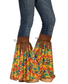 a woman's legs wearing boots with colorful flowers on the bottom and brown sued soles