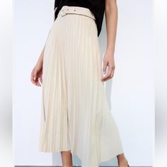 New With Tag Midi Skirt With A High Waist And Tonal Belt. Zip Closure. Outer Shell 100% Polyester Ecru | 3046/031 1058 White Pleated Midi Skirt For Spring, White Midi-length Pleated Skirt For Spring, Chic Belted Midi Pleated Skirt, White Skirt For Fall Day Out, White Fall Day Out Skirt, Chic White High-waisted Pleated Skirt, White Casual Pleated Skirt For Work, High Waist Cream Skirt For Summer, Casual White Pleated Skirt For Work