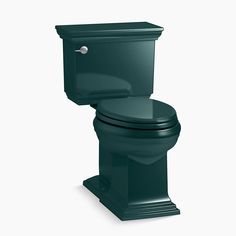 a green toilet sitting on top of a white floor