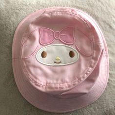 My Melody Bucket Hat Child Size Nwot, Never Worn! Excellent Condition Pink With My Melody’s Face On Top And Embroidered Words “My Melody” On Back Attached Chin Strap Adjustable Cute Cotton Bucket Hat, Cute White Cotton Bucket Hat, Pink Kawaii Hat One Size Fits Most, Cute Bucket Hat For Play, Cute Bucket Hat For Beach, Cute Adjustable Brimmed Bucket Hat, Pink Kawaii Cap, Kawaii Pink Cap, Cute Adjustable Bucket Hat