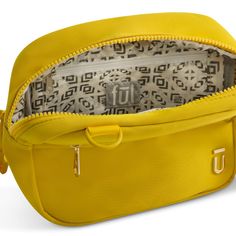 Add a touch of modern flair to your accessories collection with the mustard yellow Ful Crossbody Bag. This stylish yellow handbag features an adjustable and removable shoulder strap, offering a customizable drop length from 11.5" to 23.5" for versatile wear. The sleek gold and mustard hardware accentuates its contemporary design, while the zip closure ensures your belongings stay secure. The bag's interior is thoughtfully designed with a back wall zip pocket and Ful's signature polyester lining, Modern Yellow Shoulder Bag For On-the-go, Modern Yellow Bags With Gold-tone Hardware, Mustard Travel Bag With Gold-tone Hardware, Yellow Travel Bag With Detachable Strap, On-the-go Yellow Shoulder Bag With Zipper Closure, Modern Yellow Bag With Zipper Closure, Yellow Shoulder Bag With Gold-tone Hardware For Travel, Modern Yellow Bags With Zipper Closure, Functional Yellow Shoulder Bag For School