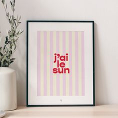 an art print with the words jali je sun in red on pink and yellow stripes