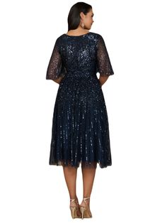 Beaded v-neckline midi dress. This dress features a long flowing A-line silhouette giving an elegant sequined Midi look. It is a great dress for a fun and easy night out, or a wedding guest! It's great for someone looking for a modest and fun look Back zipper Beaded tulle on stretch jersey lining Professionally clean Imported Short sleeves Midi dress Fits true to size, we recommend ordering your normal size. Fitted body with flowing skirt Glamorous Embellished V-neck Midi Dress, Holiday Gala Midi Dress, Embellished Sequin Midi Dress For Formal Occasions, Knee-length Sequin Midi Dress For Formal Occasions, Sequin Midi Dress For Cocktail, Cocktail Midi Sequin Dress, Sequin A-line Evening Dress, Midi Length Gala Dress With Contrast Sequin, Elegant A-line Sequin Dress For Evening