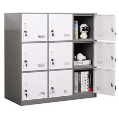 a metal locker with several doors and shelves