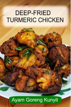 fried turmeric chicken on a white plate