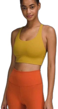 Yellow Sleeveless Stretch Sports Bra, Yellow Stretch Sleeveless Sports Bra, Yellow Stretch Activewear With Light Support, Yellow Stretch Sports Bra, Yellow Moisture-wicking Activewear For Workout, Yellow Sleeveless Sportswear Activewear, Yellow Sleeveless Activewear For Sports, Yellow Sleeveless Sports Activewear, Yellow Sleeveless Sports Bra For Gym