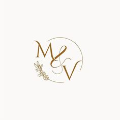 the letter m and v with an olive branch on it is shown in gold foil