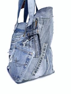 Recycled jeans bag Large denim bag Jeans handbag Denim handbag Jeans bag purse Denim purse bag Jeans purse Denim purse Denim bag Bag women Denim tote bag Jeans tote bag Jeans shopping bag This is a comfortable and capacious city bag. Every day bag.Its simple and functional character allows you to fit everything you need inside throughout your entire day. It is voluminous yet neat, making it a great addition to a loose fitting and elegant clothing. This large jeans bag is made for women who appre Distressed Denim Blue Bag For Daily Use, Distressed Denim Blue Bag For Everyday Use, Upcycled Denim Blue Denim Bags, Everyday Distressed Denim Bag, Distressed Denim Shoulder Bag For Daily Use, Denim Distressed Shoulder Bag For Daily Use, Denim Blue Distressed Bag For Daily Use, Everyday Distressed Denim Blue Bag, Large Capacity Denim Bag