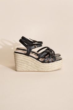 A perfect blend of style and comfort for your summer wardrobe. These sandals feature a cross strap design crafted from synthetic raffia, exuding a trendy and summery vibe. The platform wedge heel adds height without compromising on comfort, making them ideal for various occasions. Toe: Open toe, round Heel shape: Wedge Material: Synthetic Imported Heel Height: 3.9" Care Instructions: Use a soft cloth and a little lukewarm water to clean the footwear after use. If necessary, add a small amount of Platform Shoes Heels, Black Platform Heels, Platform Wedge Heels, Sandal Platform, Platform Sandals Heels, Strap Design, Pump Sandals, Wedge Sandal, Cross Straps