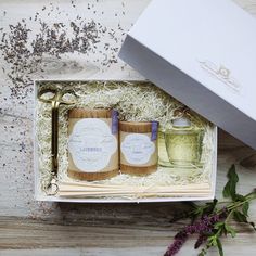 an open box containing two bottles of lavender