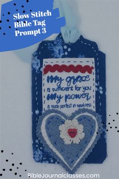 a cross stitch bookmark hanging on a wall with the words my grace is always for you