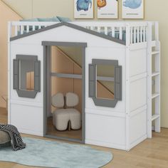 a child's bedroom with a loft bed and stairs