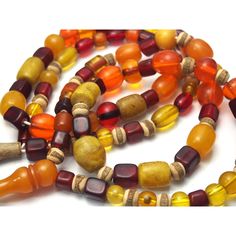 Nepali Plastic Resin "Amber" Beads Approx. 26" long Bead Approx. 10mm x 8mm to 21mm x 19mm Amber Beaded Necklaces With Large Oval Beads, Amber Beaded Necklace With Large Oval Beads, 8mm Amber Beads For Jewelry Making, Amber 8mm Beads For Jewelry Making, Single Strand Amber Beaded Necklace With Round Beads, Amber Single Strand Beaded Necklace With Round Beads, Spiritual Amber Beaded Necklaces With Large Beads, Amber Beaded Necklaces With Spacer Beads For Jewelry Making, Amber Bead Necklace