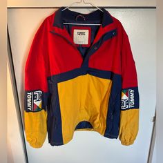 Awesome Jacket With Retro Look. Pretty Awesome Piece And It’s In Great Condition! Vintage Yellow Windbreaker For Winter, Retro Yellow Windbreaker For Winter, Winter Yellow Color Block Outerwear, Tommy Hilfiger Long Sleeve Windbreaker For Fall, Retro Yellow Windbreaker For Fall, Yellow Long Sleeve Track Jacket For Winter, Vintage Yellow Long Sleeve Windbreaker, Yellow Vintage Long Sleeve Windbreaker, Red Tommy Hilfiger Long Sleeve Outerwear