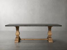 a table with two wooden legs and a black marble top, on a gray background