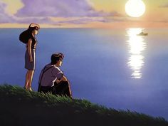 two people sitting on the grass looking out at the water