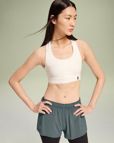 A racerback sports bra designed for short runs and yoga sessions. Providing light support for laid-back days. The Pace Bra is designed to look good and feel even better, featuring a racerback silhouette with light support and no extra padding. Seamlessly taking you from run club to coffee in a laid-back style, wear it on its own or with a layer on top. Why not pair it with the Pace Tank? Made with innovative CleanCloud® polyester, for a material so soft and easy-to-wear that your body will thank Sporty Racerback Sports Bra In Recycled Polyester, Sporty Recycled Polyester Racerback Sports Bra, Seamless White Sports Bra For Running, White Seamless Sports Bra For Running, Versatile Sports Bra For Light Impact Sports, Recycled Polyester Racerback Sports Bra, Recycled Polyester Sports Bra, Light Support Racerback Sports Bra In Recycled Polyester, Recycled Polyester Light Support Racerback Sports Bra