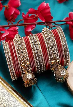 Alloy Based Bangles in Red and Golden Allured with Stones and Beads This set consists of 26 Bangles Traditional Wedding Jewellery, Red Bangles, Wedding Happy, Valentines Day Wedding, Jewelry Words, Bangles Indian, Bridal Bangles, Crystal Bangle, Bangles Style