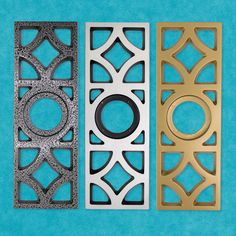 three different types of decorative panels on a blue background