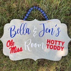 a sign on the grass that says, bella and jean's one miss room