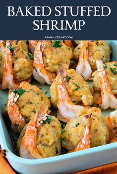 baked stuffed shrimp in a blue casserole dish