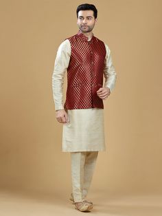 A gold zari brocade vest to pair with any kurta with statement button closures at the front. Occasion: Style this vest with pajama pants and a kurta for a welcome dinner or sangeet night, or style it with a any dress shirt and trousers for a sleek Indian wedding reception look! WASH CARE INSTRUCTIONS - Please Dry clean only. Slight color variation is possible due to digital photography. **Kurta & Pajama not included Bollywood Brocade Nehru Jacket For Festive Occasions, Festive Brocade Kurta For Puja, Gold Nehru Jacket For Festivals, Straight Kurta Style, Traditional Sleeveless Nehru Jacket For Festive Occasions, Festive Brocade Nehru Jacket, Traditional Sleeveless Kurta For Festivities, Sleeveless Nehru Jacket With Zari Work For Festivals, Traditional Sleeveless Vest For Eid, Gold Nehru Jacket For Festivals