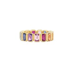 Add a touch of timeless elegance with this luxurious 18K gold bezel set eternity ring. Featuring a stunning array of precious and semi-precious stones, totaling 3.76 carats, each gem is carefully encased in a smooth gold bezel that enhances its vibrant brilliance. Whether you're drawn to the rich hues of sapphires, the regal sparkle of rubies, or the kaleidoscope of other colorful gems, this ring delivers a captivating pop of color and sophistication. Perfect for stacking or standing alone, it's Emerald Cut Eternity Band, Rainbow Gemstones, Semi Precious Stones, Eternity Band, Eternity Bands, Bezel Setting, Emerald Cut, Eternity Ring, Semiprecious Stones