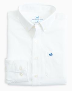 Young boys won’t mind dressing up in this ultra-comfort button down shirt. With moisture-wicking fabric, UV sun protection and lightweight 4-way stretch, this classic white button down is perfect for school, church, and any day in between. Classic School Shirt With Button Closure, Classic Solid Shirt For School, White School Shirt With Button Closure, Preppy White Button-up Shirt, White Button-up Preppy Shirt, White Preppy Shirt With Button Closure, Preppy Boys Outfits, Preppy Boys, Southern Outfits