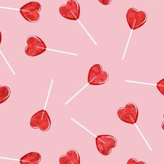 hearts and lollipops on a pink background