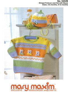 a knitted sweater and hat are displayed on a shelf with the words mary maximum