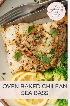 a white plate topped with fish next to broccoli and lemon wedged bread