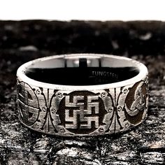 "This antique style, Viking Ring with detailed deep engraving will inspire your imagination. It has multiple Viking symbols and imagery engraved around the ring. This style is made to order and it's available from sizes 5 to 15. The inside of the band is rounded for Comfort Fit. This exquisite ring is a great addition to any attire. It can be worn as a Friendship Ring, Promise Ring, Engagement Ring, Anniversary Ring and Wedding Band. If you like the design, but prefer a different ring style or d Symbolic Engraved Ring With Intricate Design, Traditional Engraved Ring With Engraving Option, Ceremonial Spiritual Engraved Ring With Intricate Design, Medieval Engraved Round Rings, Handmade Viking Style Ring As Gift, Engraved Medieval Rings, Viking Wedding Ring Fantasy Forge Jewelry, Viking Style Engraved Adjustable Rings, Adjustable Engraved Viking Rings