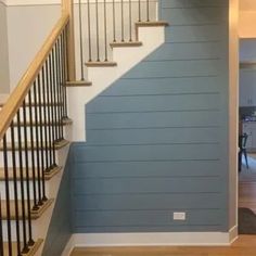 the stairs in this house are painted blue